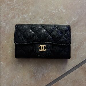 Elegant Black Quilted Leather Wallet with Gold Accent